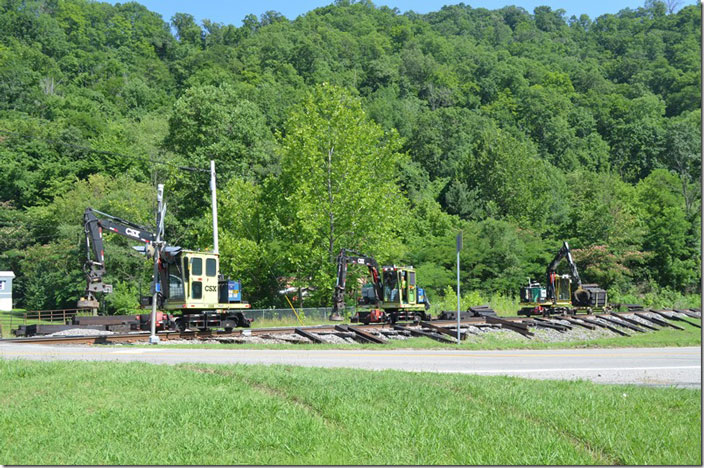 Picking up old spikes with magnets. CSX tie gang. Robinson Creek KY.