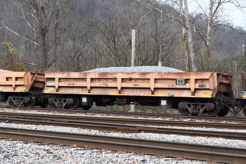I proceeded on to Shelby to record this eclectic bunch of air dumps entering the yard. CSX 913334 was built by DIFCO Inc. of Findlay OH, in 07-1992. The load limit is 181,800 and it is labeled to hold 50 cubic yards of material. DIFCO was the Differential Steel Car Co. It was acquired by Trinity Industries in the early 2000s.