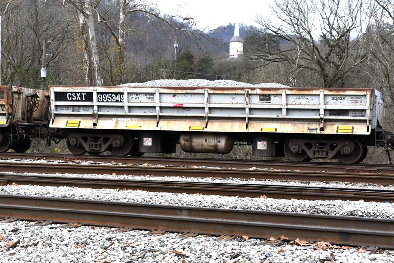 CSX 995349 is ex-Conrail 53505. This former SD42A class has a load limit of 187,300 and 1,350 cubic feet. It took some digging to determine that PACCAR (Pacific Car & Foundry) built these for Conrail in 1978 at their Renton WA plant. PACCAR has many lines of business, but the most familiar are Kenworth and Peterbilt trucks.
