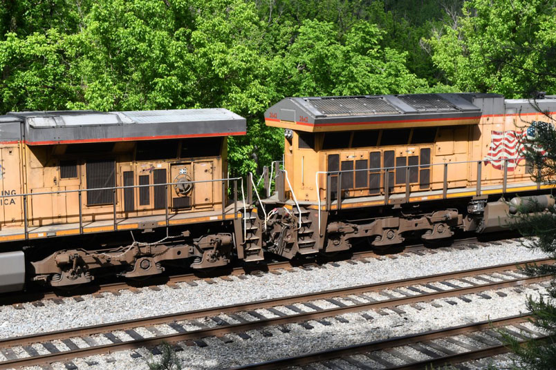 UP 5483 was originally an ES44AC, built in 2005. UP no. 2642 was an ET44AC built in 2015. To many railfans, these are "just another GE wide-cab", but there is a notable difference in appearance from the cab toward the rear. Remember how we made a big deal about the difference in appearance between, say, a SW-7 and SW-9, a RS-2 or a RS-3, or a U28B and a U30B. Trouble is, we can't remember all of these new manfacturer's models, let alone the railroad's designation when they modify an engine.