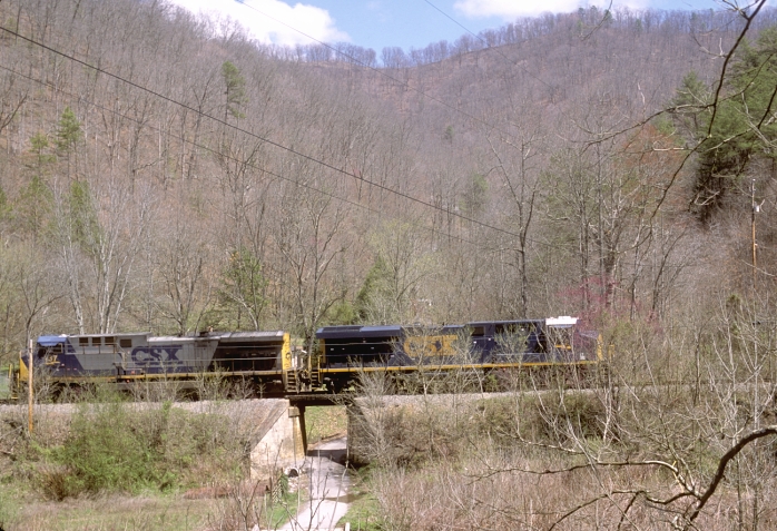 Drifting back down the track, the engines cross "Tunnel Road." 