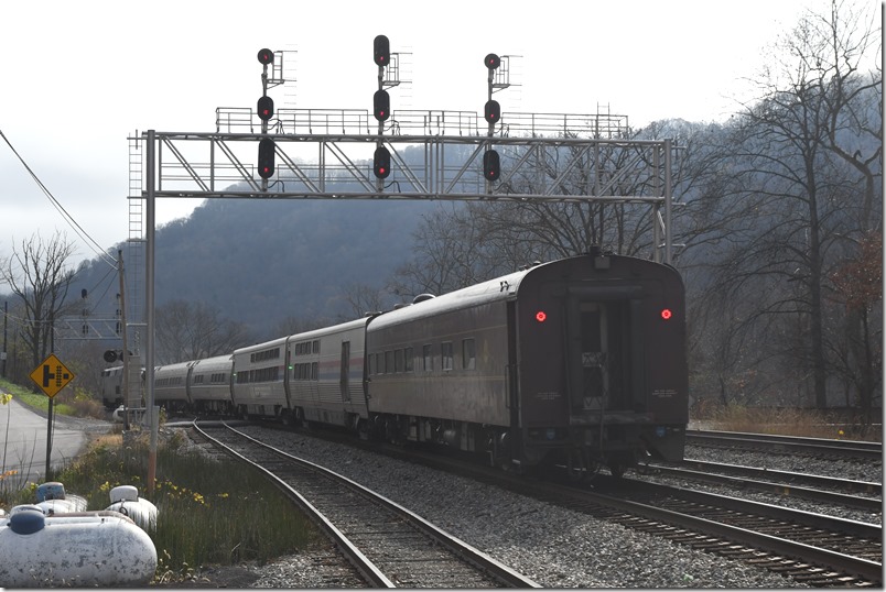 With markers lit, this DOTX (Federal Railroad Administration/U. S. Dept. of Transportation) car brought up the rear. Meadow Creek EE.