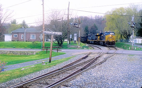 CSX 876-667 slowly tread through Meadow Bridge.