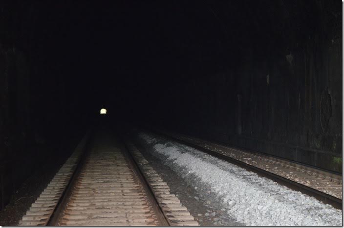 New Kingwood Tunnel was opened in 1912 and is 4,250 feet in length. The new alignment was much easier for eastbound loaded coal trains. CSX Kingwood Tunnel West End WV. View 2.