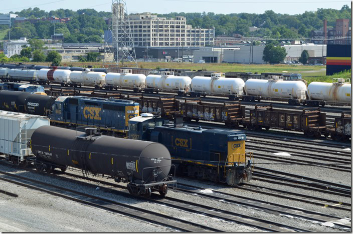 CSX MP15T 1227 and SD40-2 8432 in the support yard from the vacant trim tower. Queensgate OH.