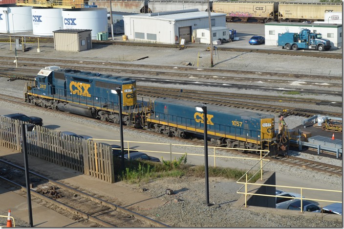 Heading to receiving yard to get another cut to hump. CSX 1057-2417. Queensgate OH.