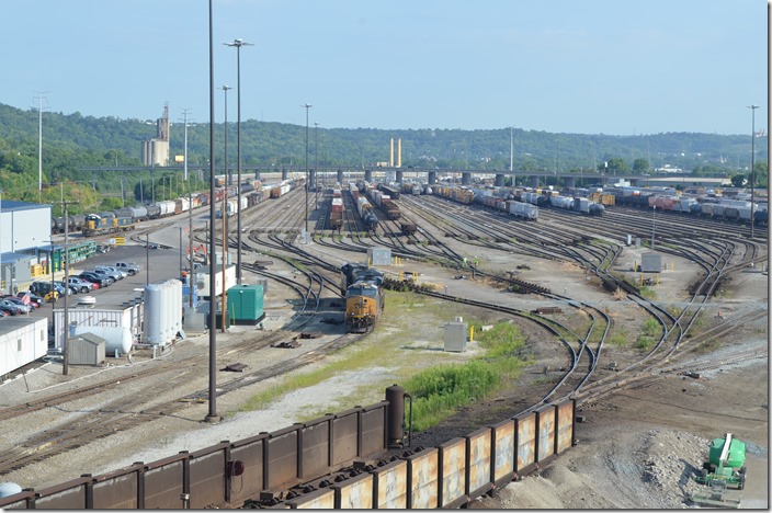 Master retarder and bowl yard with 2417-1057 heading into receiving yard. CSX bowl yard. Queensgate OH.