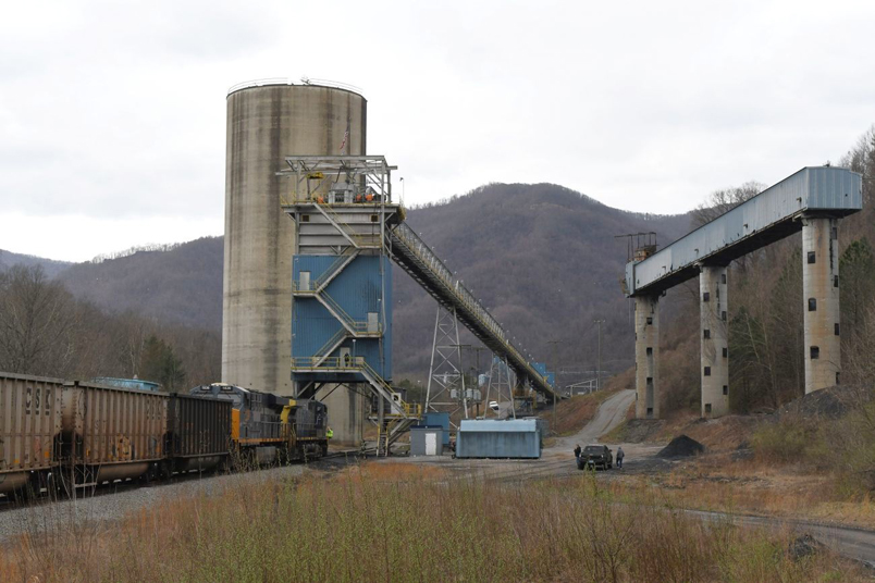 Tim and Micah have beaten the train to Lynch #3. U. S. Steel built the concrete stacking tubes and silo as Lynch #2.