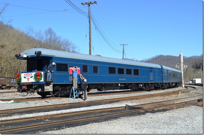 CSX bus car 994310 “West Virginia” was USAX before coming to the C&O. Most everything has been removed from the inside for storage of the gifts to be handed out.