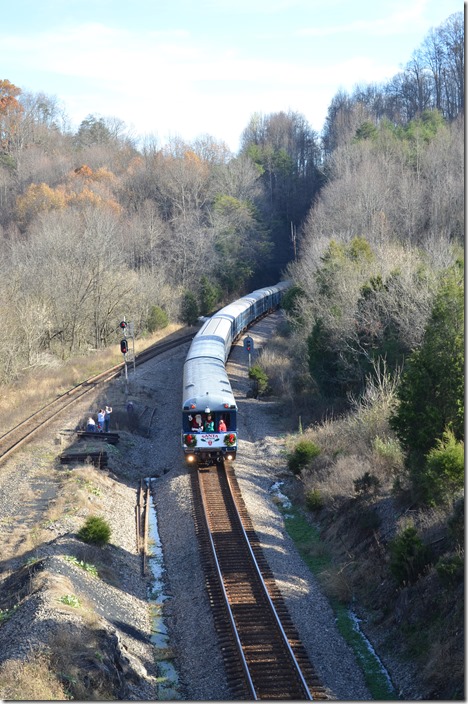 Santa is used to spending a whole night in a sleigh, but spending 8 1/2 hours on the rear platform of business car “West Virginia” waving must have been tiring! CSX Santa Train Frisco.