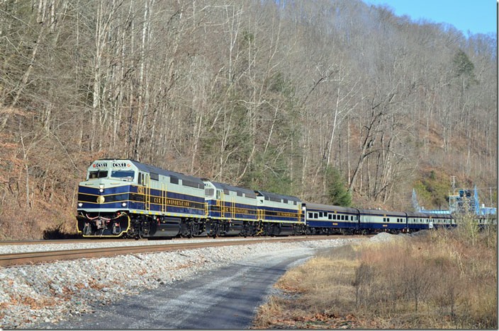 Running beside Allen passing siding just south of McClure. In the background is a huge ventilation fan for the McClure coal mine. CSX 1-3-2.