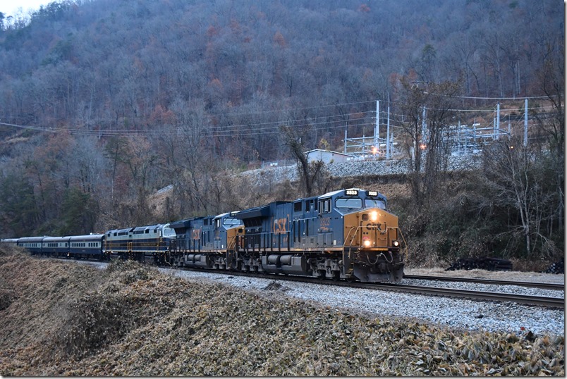 It starts getting daylight at Elkhorn City. P001-18 picks up speed passing the former Clinchfield’s Elkhorn Yard behind 3323-3411-CSX 1-CSX 2 with 13 cars. One of the passenger units had mechanical problems on the way north, and two GEs were commandeered off a passing manifest. Last year this train had three F40s which would have provided extra protection. CSX Santa Train. Elkhorn Yard.