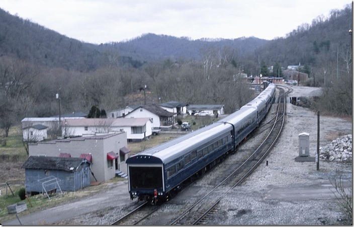 Eastbound office car train P955-27 arrives Shelby on 02-27-2013.