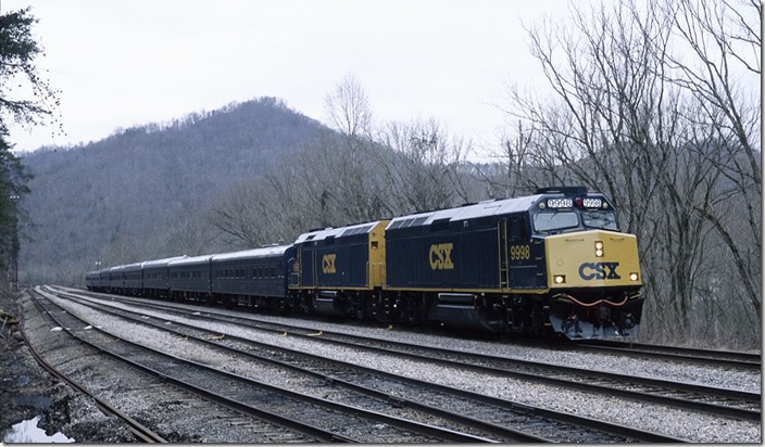 P955-27 behind 9998-9992 departs Shelby with eight cars.