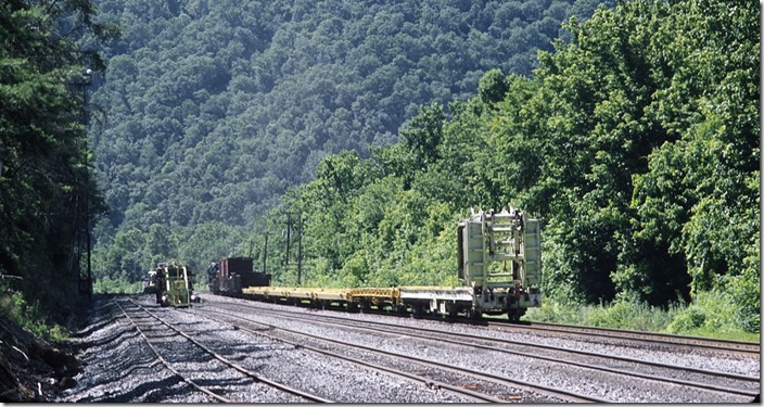 A surfacing gang works at the east end of Shelby Yard.