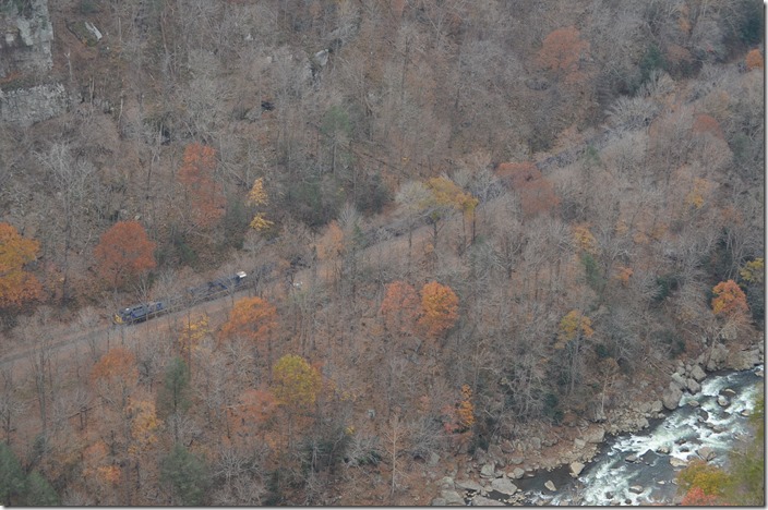 CSX 502 leads U430-12 (Scotts Branch mine to Irmo, SC) with 100 PMRX loaded hoppers. View 2.