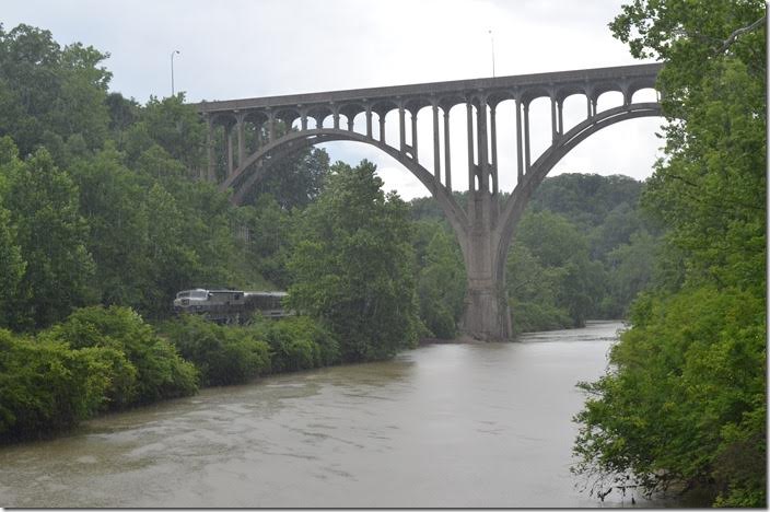 Now it was time for those ominous clouds to do their thing. I was drenched before I got back to the car! The late John Rehor photographed a southbound B&O ore train from this bridge headed by a pair of Mikes. B&O 800. Brecksville OH.