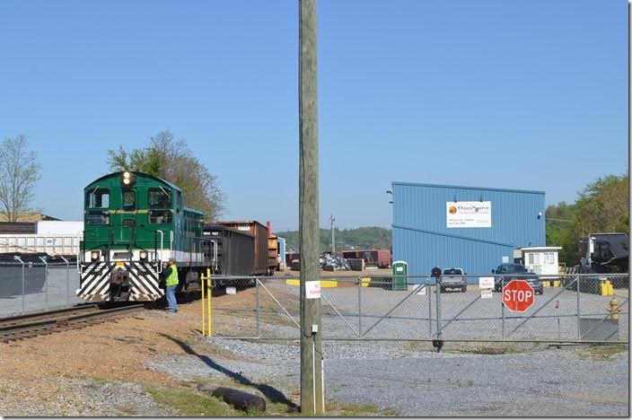 SW-1200 switching the OmniSource metal recycling center on the former CRR and adjacent to the former ET&WNC engine house and yard. ETRY 214 Johnson City TN.