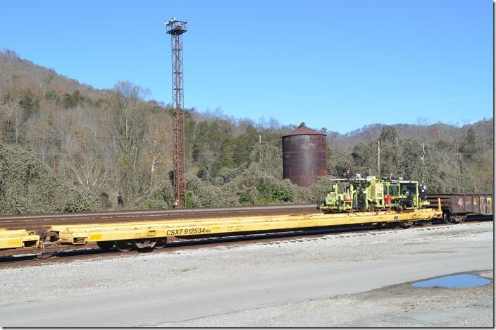 CSX MW 912534 is a former piggyback flat built in 1977 that is now used to haul track equipment. Shelby KY. 11-17-2017.