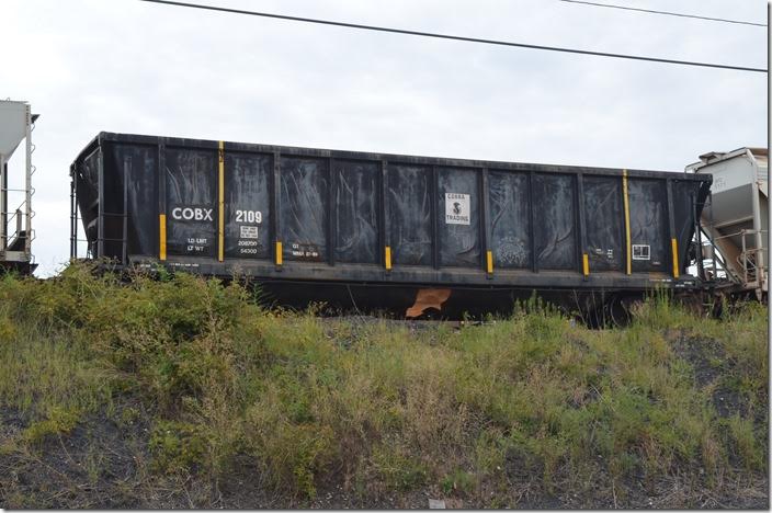 COBX (Union Tank Car Co.) gon 2109 is in the former coal classification yard at Russell KY on 08-06-2017. This “Coalveyor” has likely been relegated to scrap metal or scrap tie service.