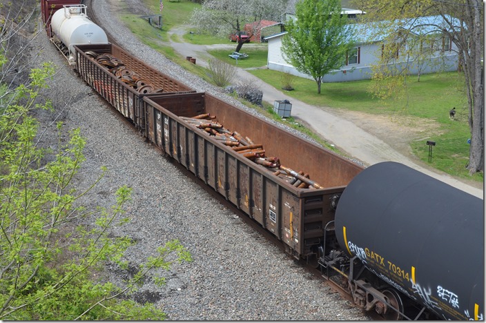 SPSX gon 323005 (Steel Processing Services (Progress Rail)) is ex-NDYX, exx-NOKL (Northwestern Oklahoma Railroad), exxx-GROX 81115 nee MILW 81115. Progress now operates the former Mansbach Metals in Ashland, so it is hard to say whether those wheels and axles will be refurbished or scrapped. Shelby KY. 04-05-2020.