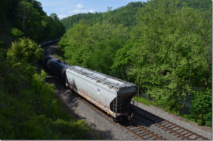 Missouri Pacific (Union Pacific) MP 718139 used as a buffer car brings up the rear of the combined K428-16 (Charlotte – Chicago-CP) and Q692 leaving Shelby on 05-17-2020. Shelby KY.