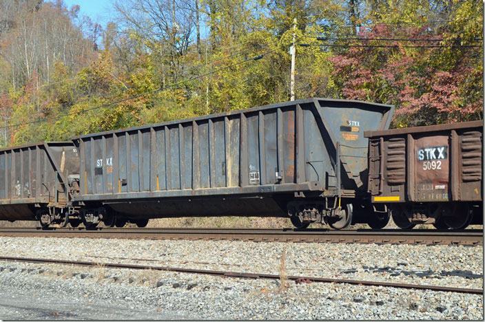 STKX gon 3229 is ex-TFOX, exx-SULX, nee-CP. 352,596, 4,400 built 04-1982. I got ahead of NS 392-12 for another shot east of Williamson at Rawl WV.