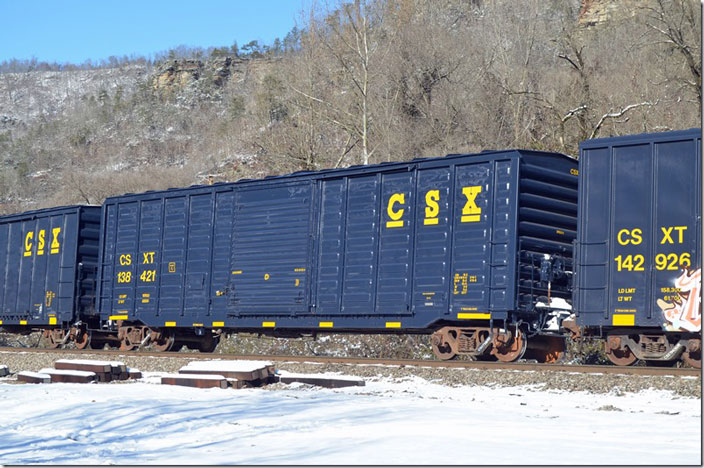 I couldn’t resist shooting clean ex-SBD box 138421. 5,277 cubic feet, 157,500 load limit and built 1980 (I think). CSX box 138421. Elkhorn City KY.