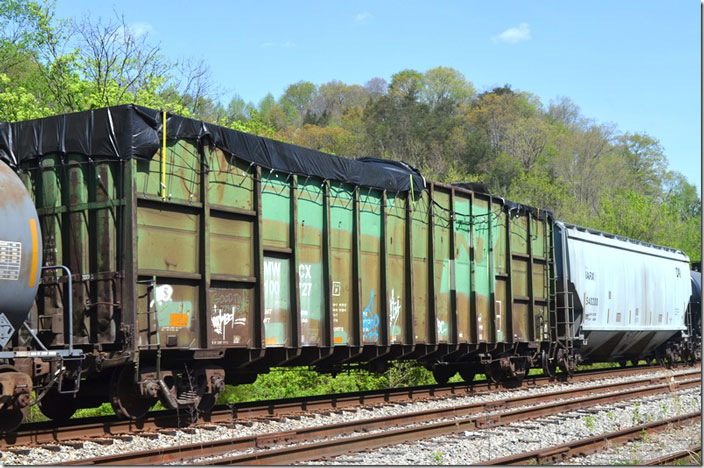 This car could have been used to haul wood chips in its younger days. MWCX 100727 gon. Ivel KY.