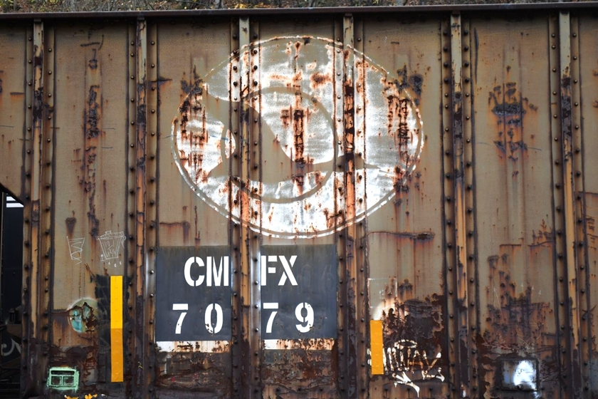 CMFX 7079 was parked by itself below the coke plant at Dismal Yard (Vansant). That flying goose logo came from Kyle Railroad. Kyle took over much of the former Rock Island line across Kansas to Colorado. I have a shot of a Kyle GP40 leased to CSX in 1989, and the goose logo is reversed. Kyle is now a subsidiary of Genesee & Western.