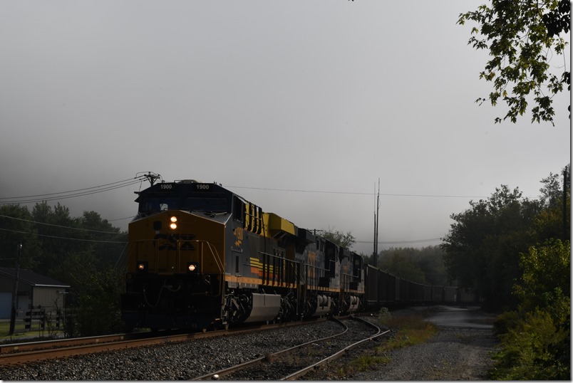 Early in the morning of 09-20-2024, the Seaboard Air Line heritage ES44AH 1900 led Shelby-Martin shifter R243-20 with 110 DKPX empties. It is passing through Betsy Layne. CSX 1900-7384-7233.