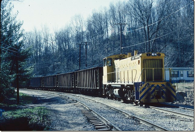KC&NW 1 shoves loads toward the barge terminal. Cedar Grove WV. 02-20-1990.