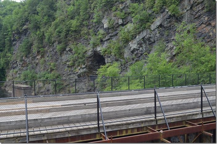 The nearest bridge now used for park access is former CNJ. Presumably the concrete pier and abandoned tunnel were also CNJ. The location is Glen Onoko PA. ex-CNJ tunnel.