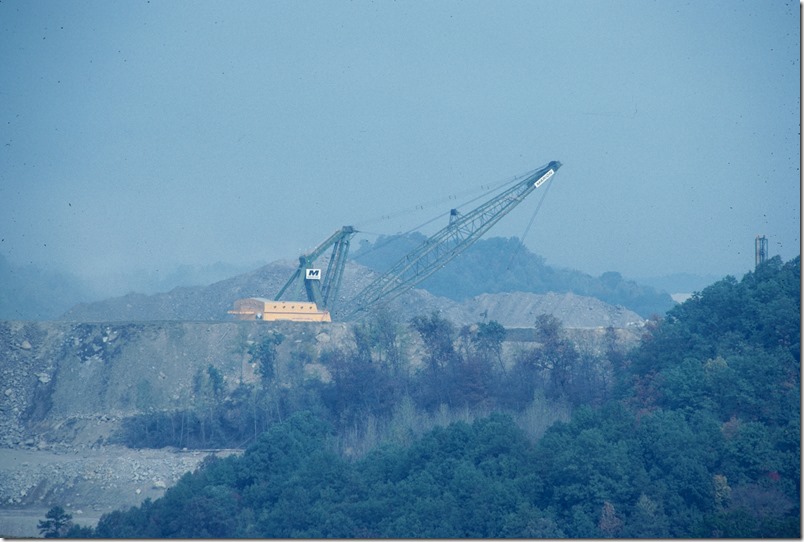 Lost Mountain Mining’s Marion dragline strips overburden a their big surface mine near Bulan just north of KY 80. This coal was trucked to their nearby Sigmon loadout at Bulan. 10-06-1984. L&N Lotts Creek.