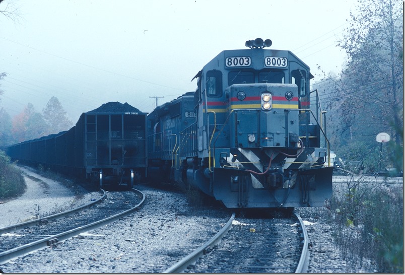 SBD SD40-2s 8003-8118 on the “Hazard No. 8” mine run have finished loading at the Sigmon unit train load-out at Bulan. 10-13-1987. L&N Lotts Creek.