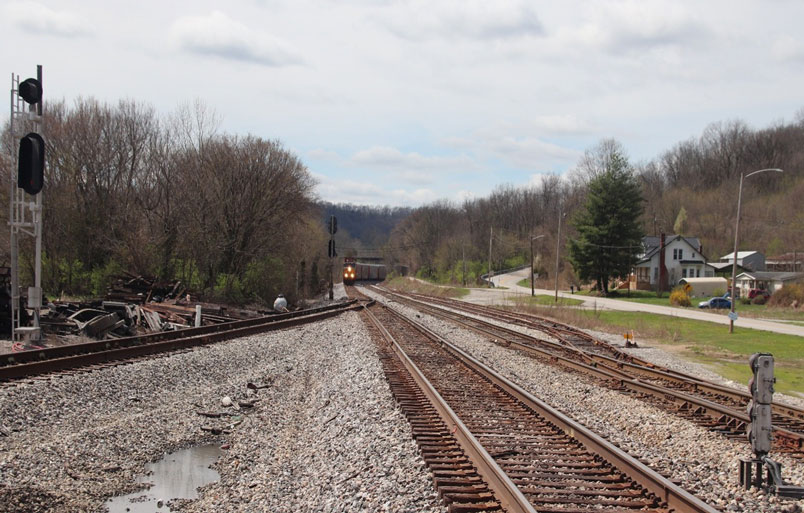CSXT 7107 at Worthville, Kentucky looking west. The train stopped at the entrance to the yard. The track on the left is siding. The track in the middle is the CSXT main line into the yard. Track on the right Carrollton Railroad.
