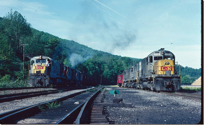 The brakeman gets back on and they depart north for Loyall and Corbin. From employee timetable #1 this would have been northward freight No. 56. Timetable No 2, issued in 1980 dispensed with most train numbers. L&N 1559 Lynch Turn-Chad.