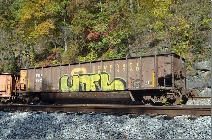 NSSX (National Salvage & Service) gon 507 is ex-SOM. It was built 02-1989, had a load limit of 205,800 lbs, and a volume of 3,600 cubic ft. Devon WV on 11-05-2021. Somerset unit trains were often loaded on the Monongahela Ry. for a power plant in New York or New England.