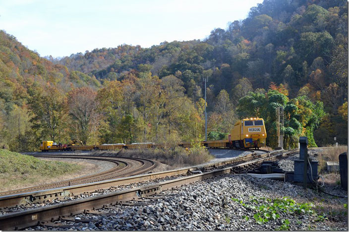 On NS’s Pocahontas District at Ought One WV, Herzog Contracting Multi-Purpose Machine 205 moves west at the Junction with the Buchanan Branch. AKA Looney’s Curve. 11-05-2021.