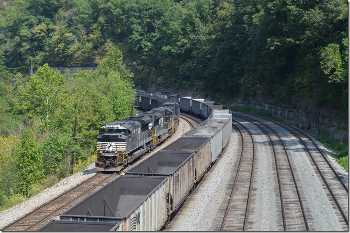 Pusher J86 with NS 1144-1000-9455 is coupled to the rear of 82G at Weller Yard.