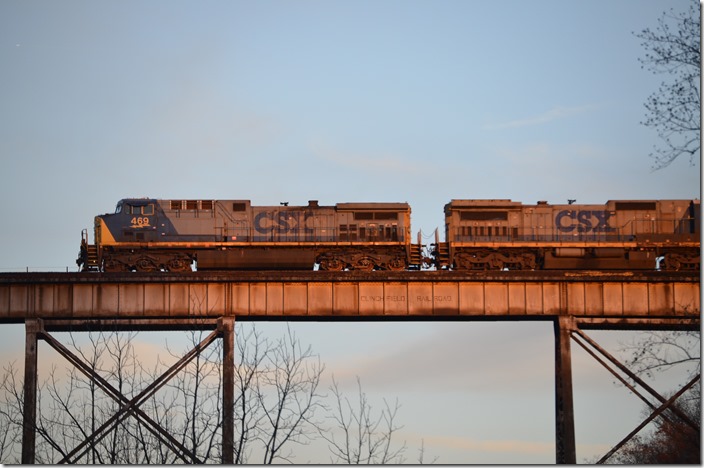 In the last rays of sunlight n/b empty ethanol train K428 rumbles toward Shelby behind 469-7503.