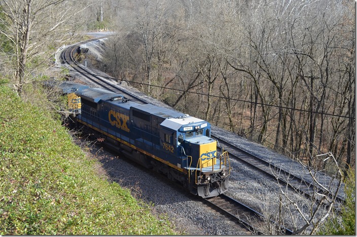 Southbound Q698 with 7642-89 slows to cross NS which is coming in from the right.