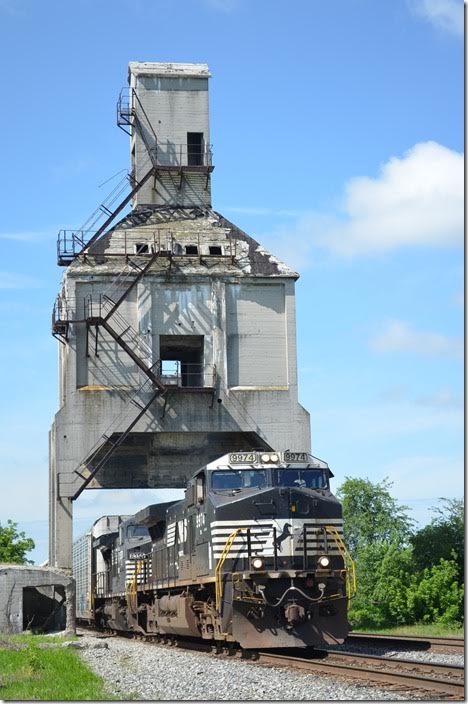 NS 9974-8350 blast by with 27V-19, an empty 42-car auto rack train from Walkerton NC to Sterling MI. NS 9974-8350. Harvey OH.