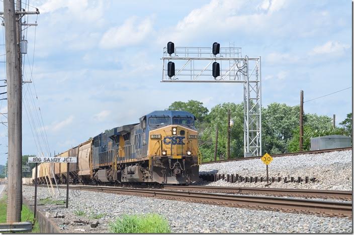 An e/b 60-car grain train rolls off the main line to the Big Sandy SD at Big Sandy Jct. in Catlettsburg. CSX 128-987. BS Jct Catlettsburg KY.