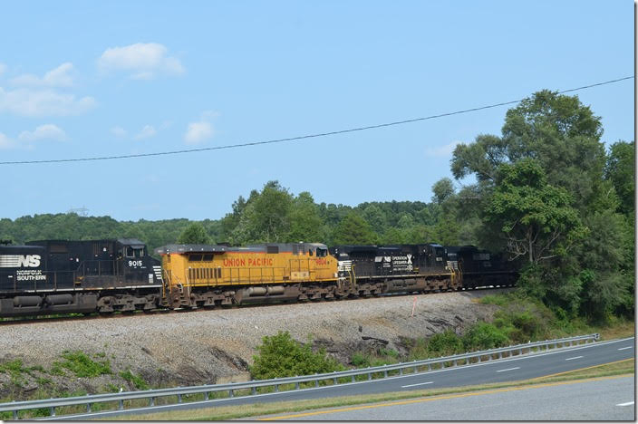 This is a grab shot across US 460 at Irving. The highway and the railroad part at Bedford, and I needed to get on to the C&OHS evening events in Lynchburg. NS 8902-9255-UP 8904-9015. Irving VA.