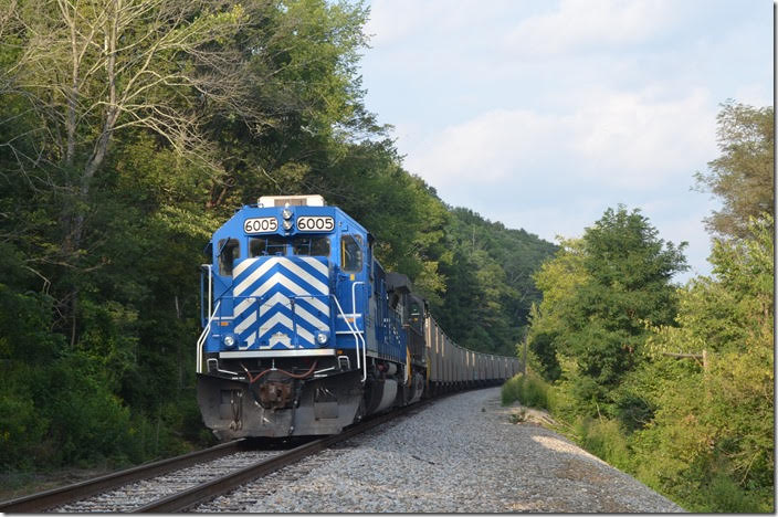 At Kellysville I found another rock train parked on the P-D main. CEFX 6005-NS 8954 had 62 system stone hoppers to be loaded at Princeton for the Belews Creek NC power plant. An Elmore crew would load this train. Another ex-Soo SD60. Kellysville WV.