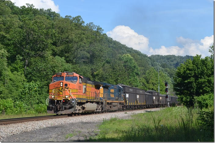 Leaving double track at Panco. Many of these hoppers were “High Tops”, and there was also one Conrail and one Southern. Vansant normally produces about 36 cars of high quality coke each day. These are accumulated at Weller Yard into one train. I have never caught one of these solid coke trains before. BNSF 5005-GECX 7619. Panco WV.