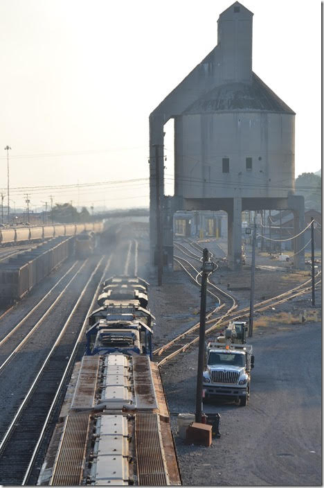 Just ahead he will pull to a stop in front of the yard office. A new crew will take command for the run down to Williamson. No more stops on the 2 hour, 20 min. lap to Pikeville. NS 8088-7264-CEFX 6019. View 2. Bluefield WV.