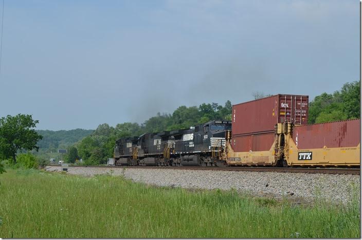 Soon to be followed by w/b double stack 233 behind NS 9721-8793-9233. No. 956 e/b with the 2-8-8-2 had to wait for these two “money” trains to get by, as MofW had one track out of service. Cyrus.