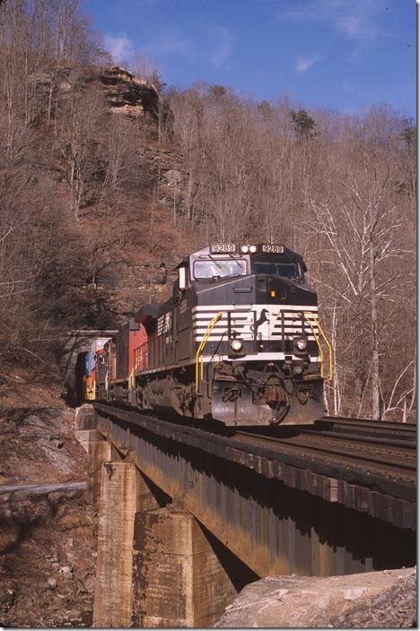 No. 23Q being an intermodal train has gone around 757 at Farm. Exiting Roderfield Tunnel. View 2.